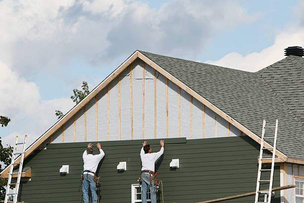 Professional Siding technician working in Winfield, IL